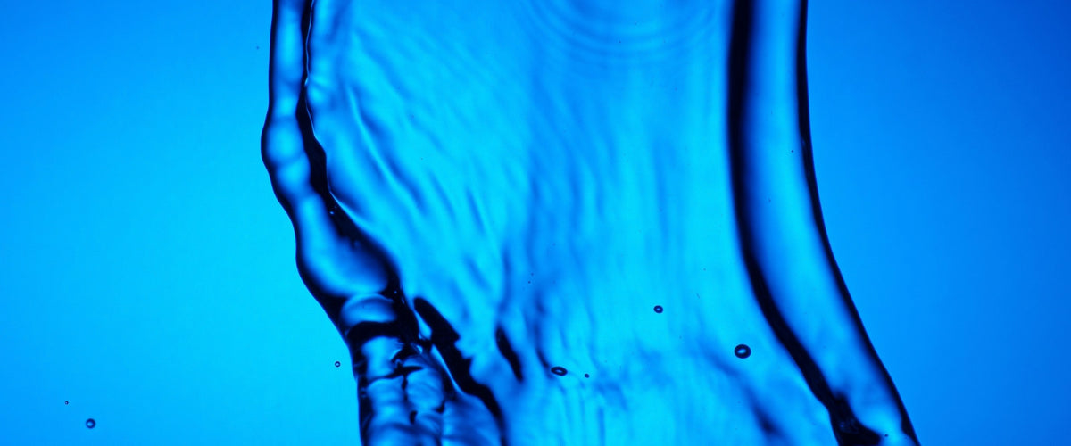 Blue water splash on a gradient background